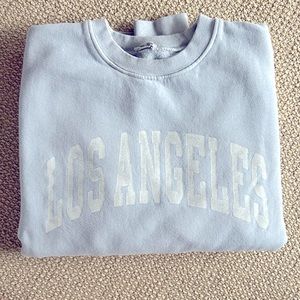 Brandy Melville John Galt Los Angeles Sweatshirt | Baby Blue | One Size